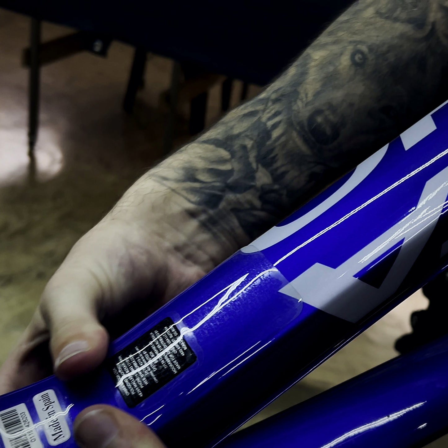 Protection film applied to the top tube shuttle contact zone